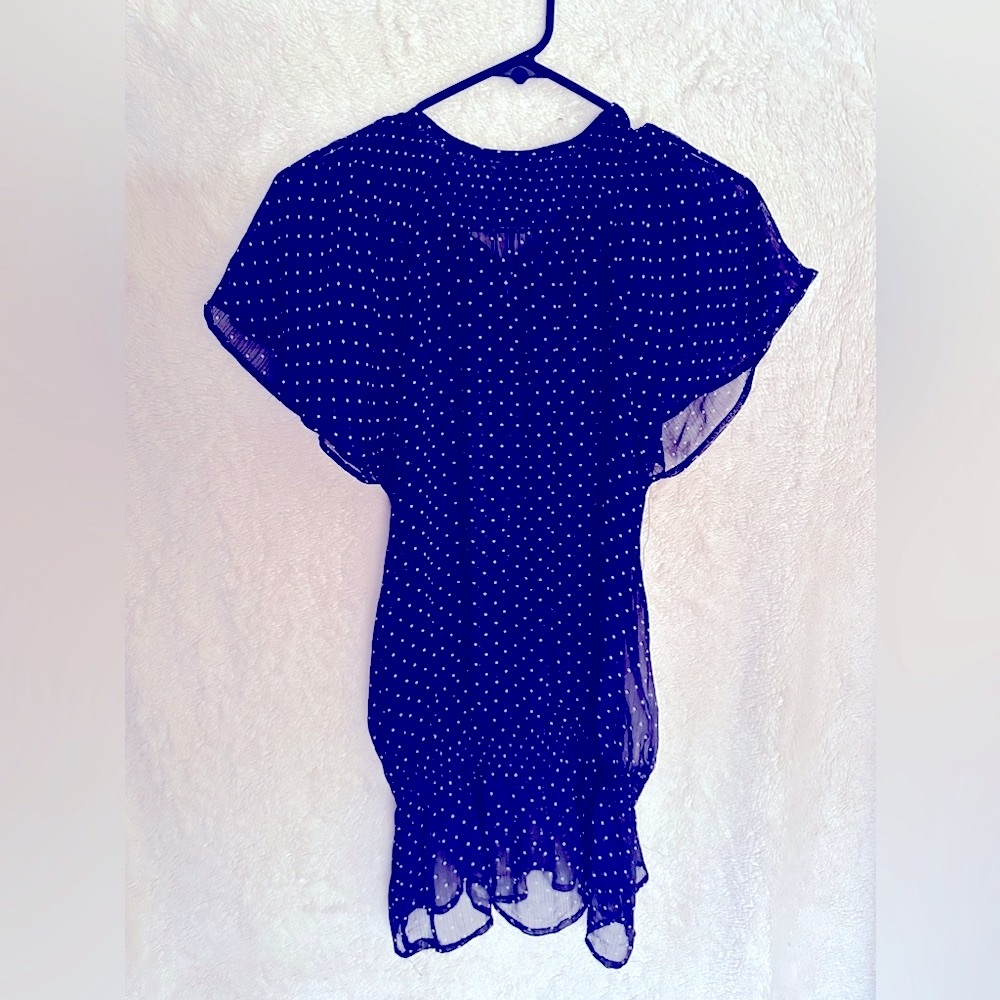 Fun 100% Polyester summer top. Dark blue with white polka dots.